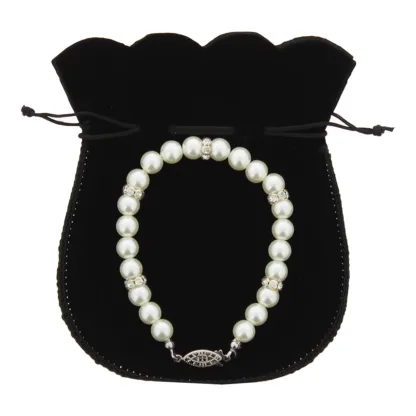 Black Pouch With Heart Bracelet